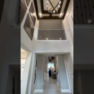 Look 🆙 2 story Foyer entrance- like the wood beams or na? Comment👇 thoughts? #floridahomesforsale